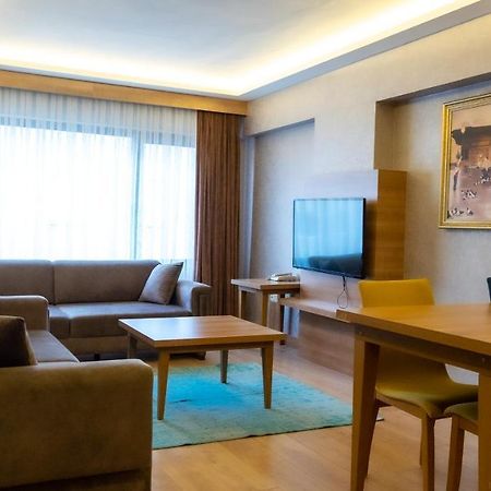 Bursa Suites Apart Otel Exterior photo A living room in a serviced apartment in Istanbul, Turkey